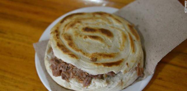 肉夹馍的肉是怎么烤的 6dfbd0281cfa49b18468003ef64d9d0f.jpeg