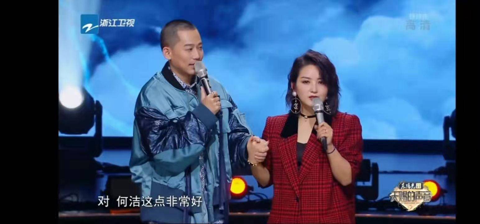 她就是何洁.在第一轮是她与苏醒的合唱.