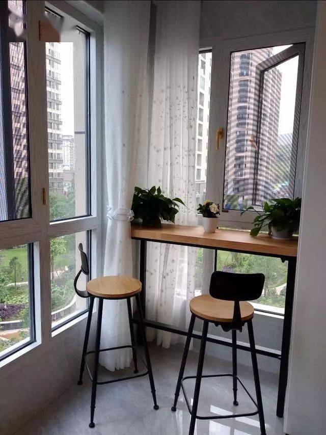 装修阳台休闲阳台这样布置椅子舒适有情趣