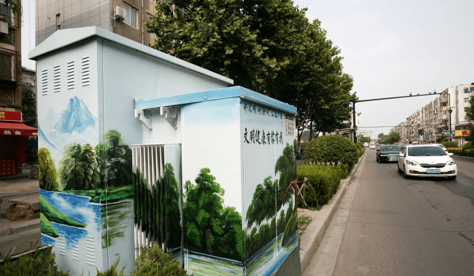 彩绘,内容包括自然风景,文明风尚,城市建筑等多个主题,让变电箱通过