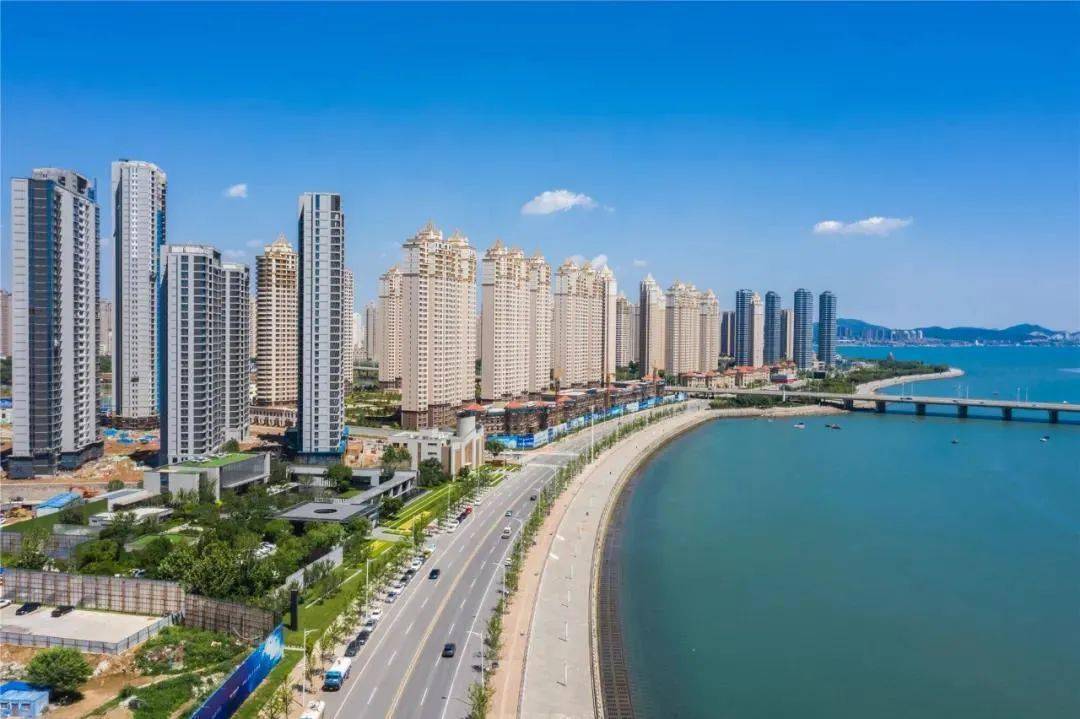 我国沿海城市经济总量占全国_沿海经济开放城市图片(3)