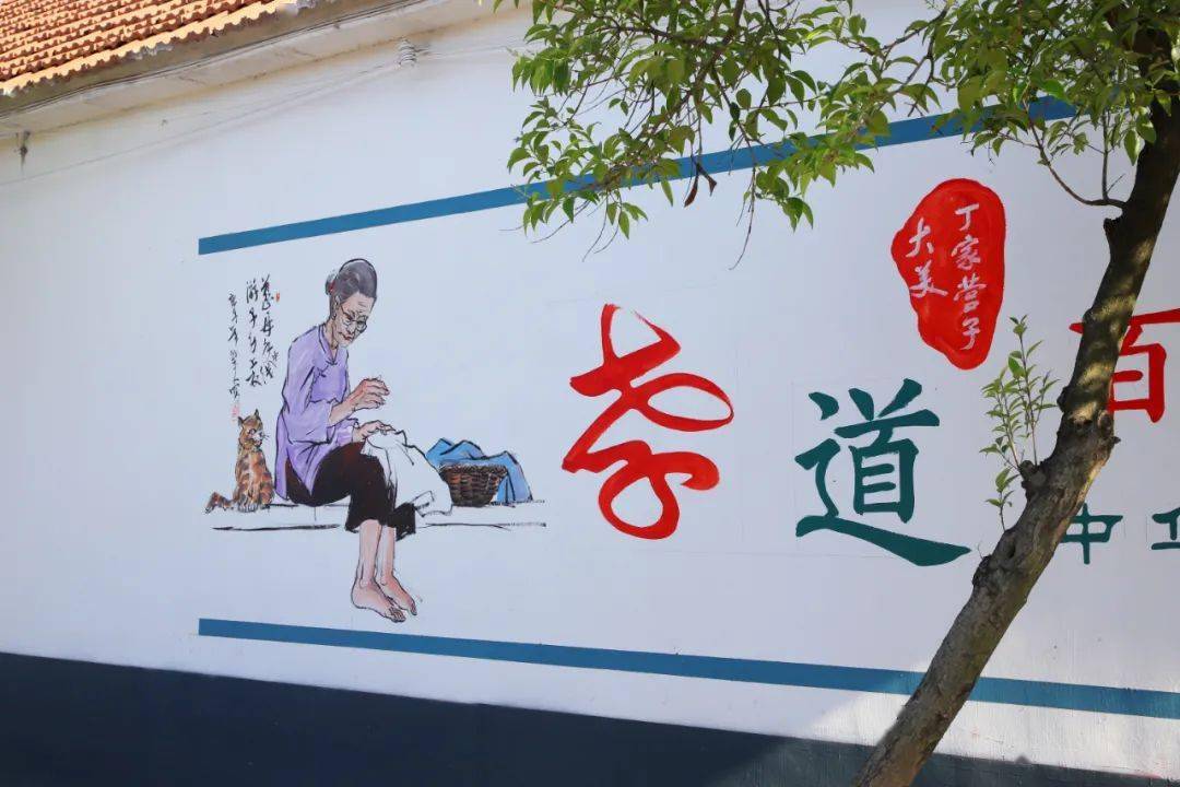 尊老爱幼,乡村文明等特色墙绘一幅幅包含社会主义核心价值观道路两侧