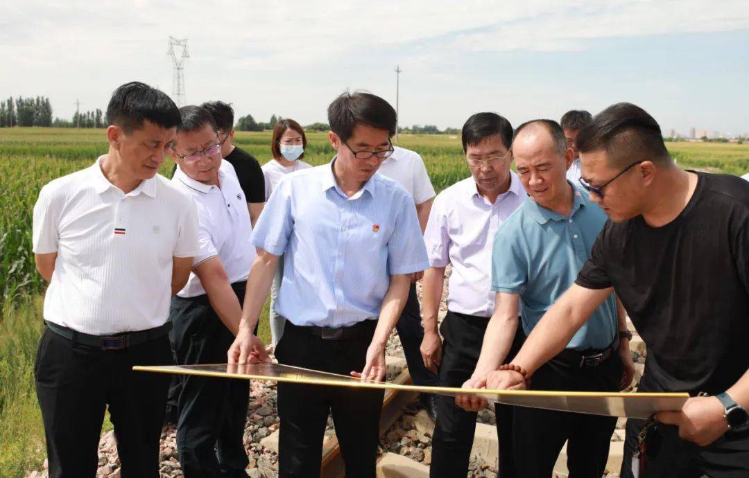 赵峻岭张文智实地调查研究高铁经济工作