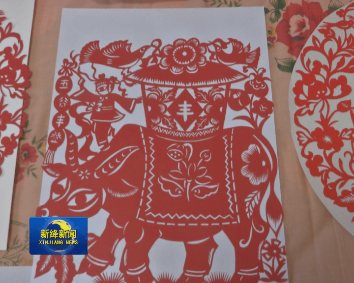节,创作了一组《十二生肖娃庆丰收,题材取材于传统民间剪纸十二生肖