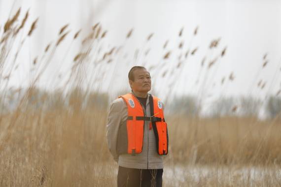 中国故事|蔚蓝家园 他们倾情守护_里海_湿地_孙庆宏