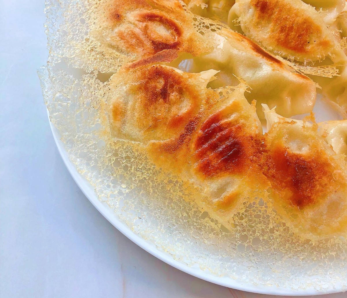 原创给美味穿上蕾丝边网红冰花煎饺有秘诀酥脆的家常美食做起来