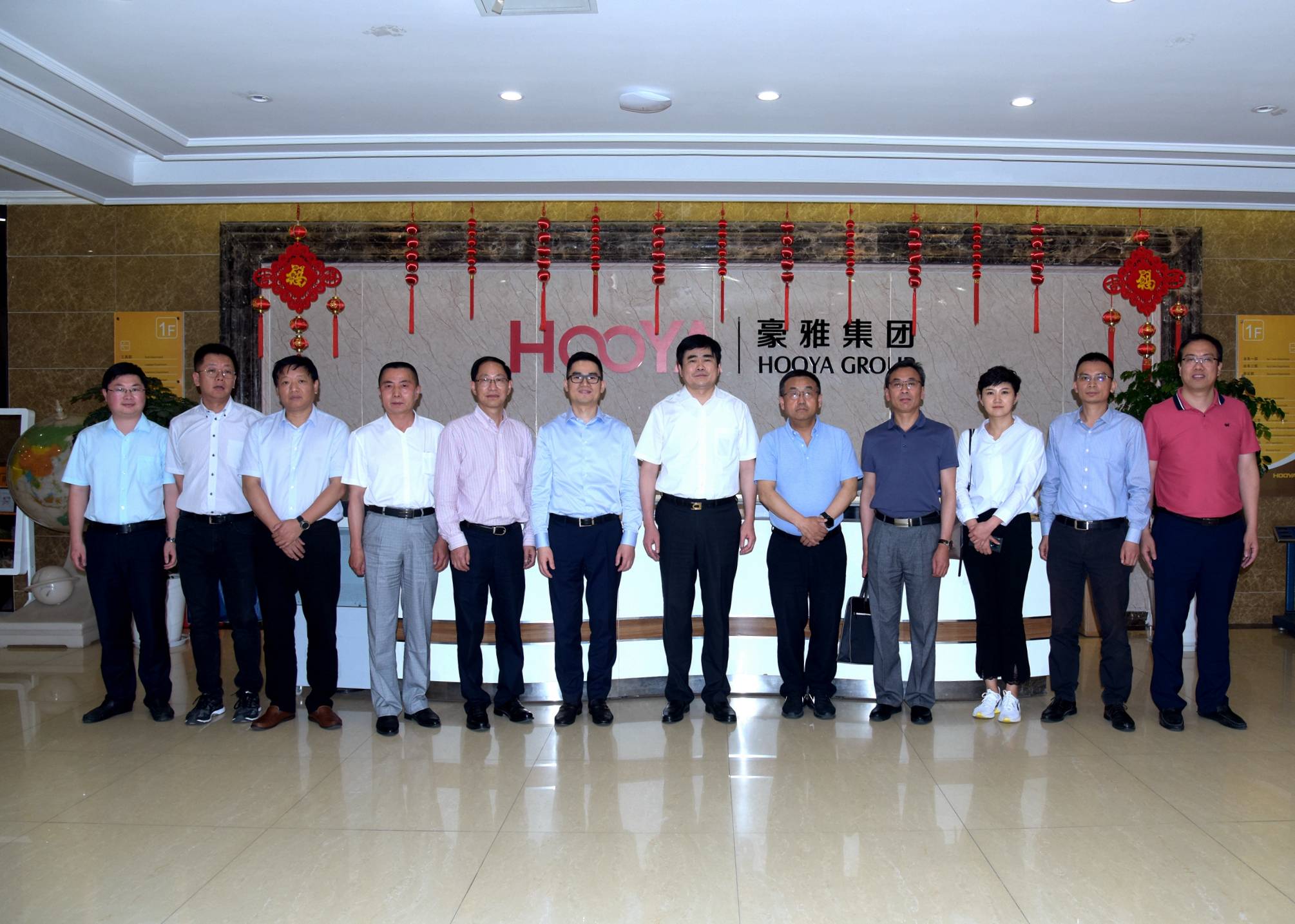 青海省商务厅宁波市商务局领导一行莅临豪雅集团参访调研