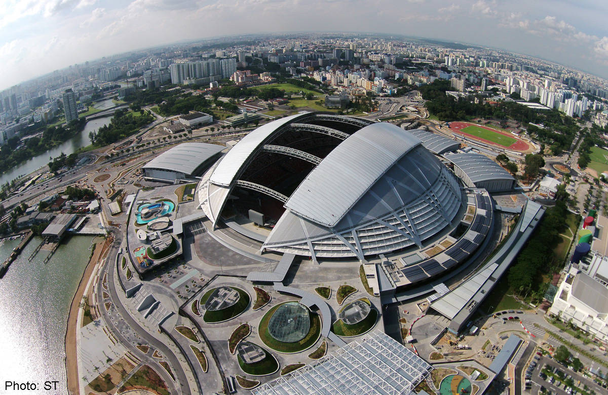 这座体育场就是新加坡国家体育场,它位于新加坡的加冷,曾在这里举行过