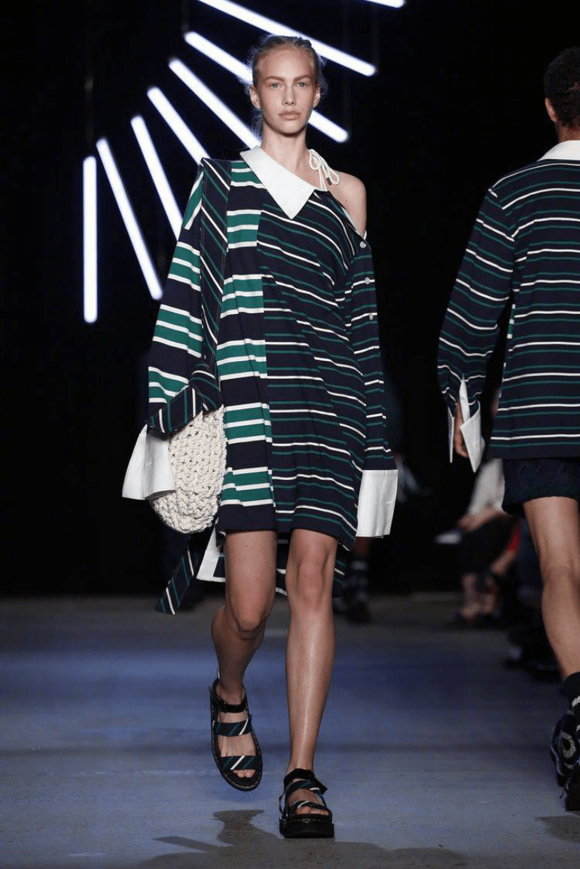 服装|张馨予穿拼接外套走机场!短发配渔夫帽,九分裤腰上别两条白毛巾