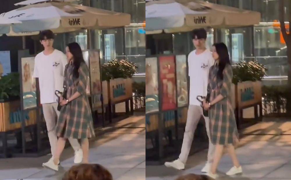 视觉|关晓彤拍戏被偶遇，穿格子裙和187cm林一散步，展现最萌身高差