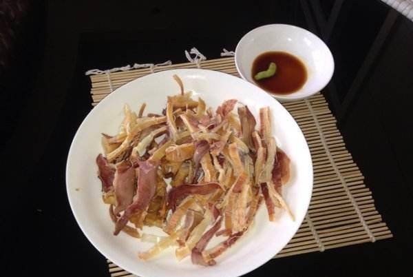 在家怎样做烤干鱿鱼 55df2f5f352040468ddc651807c2b4fb.jpeg
