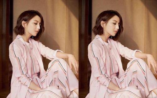 领口处|佟丽娅海边漫步笑起来宛若少女,离婚后状态更好,清爽又甜美