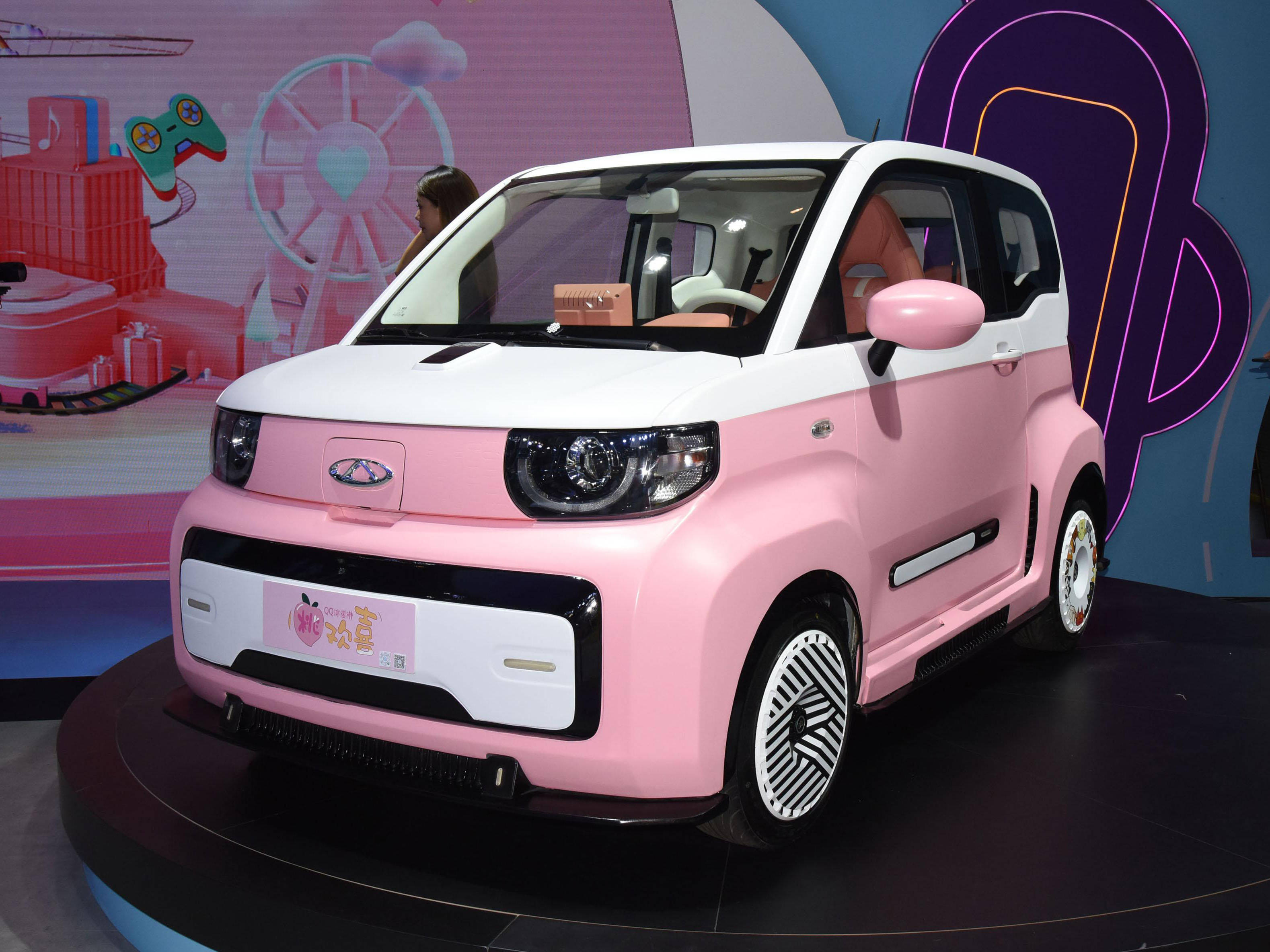 ev,作为icar生态旗下的首款产品,qq冰淇淋定位为入门级纯电小型车,不