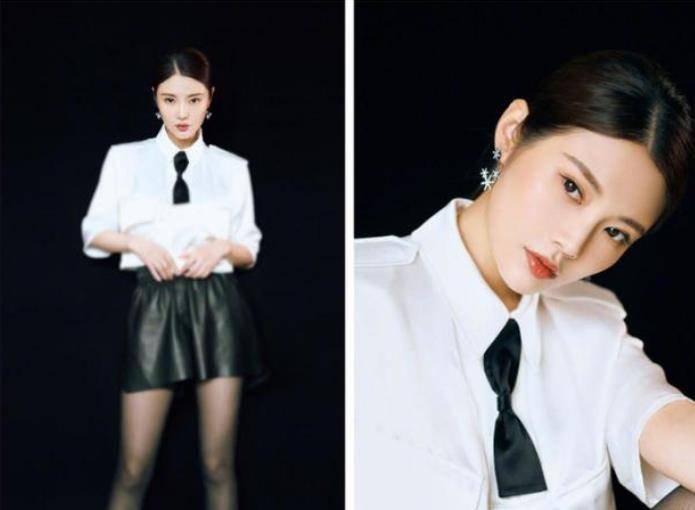 短裙 徐冬冬身材真好，皮质短裙配白色小西服，看着性感又妩媚