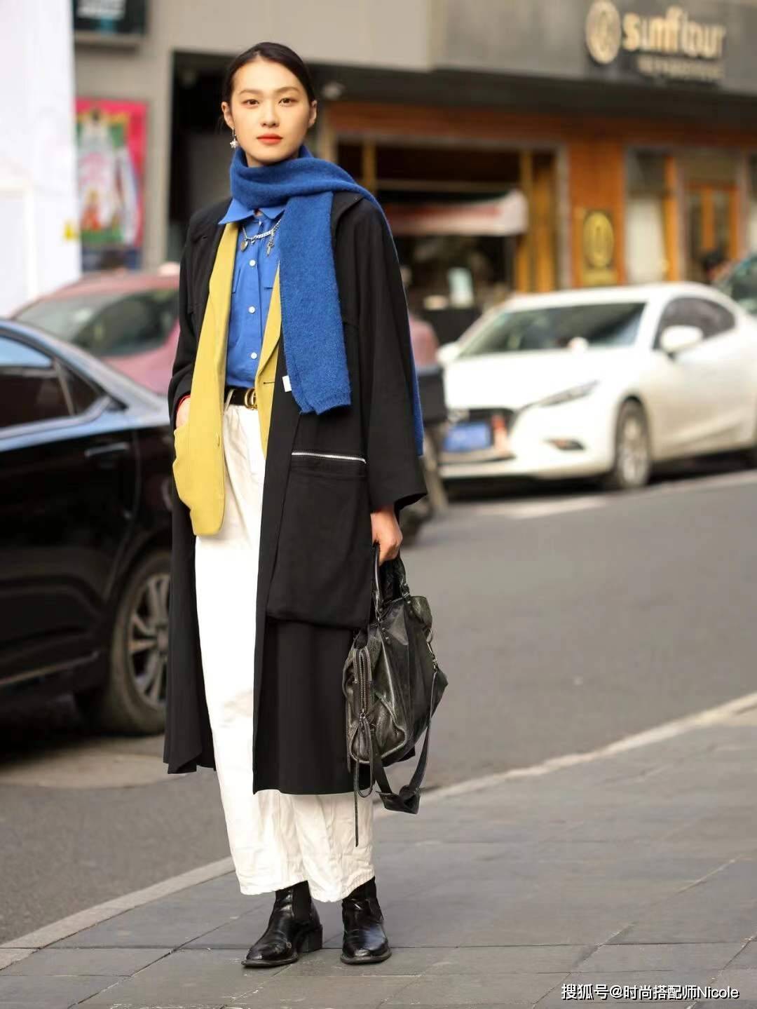 降低 去了上海才知道,会穿的女人都爱“叠穿”,不露腿不露腰照样时髦