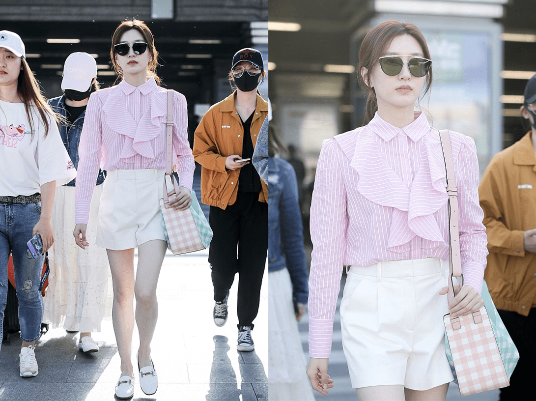 江疏影 江疏影的时尚感跟别人真不一样,穿衬衫都大红大绿又大花,好张扬