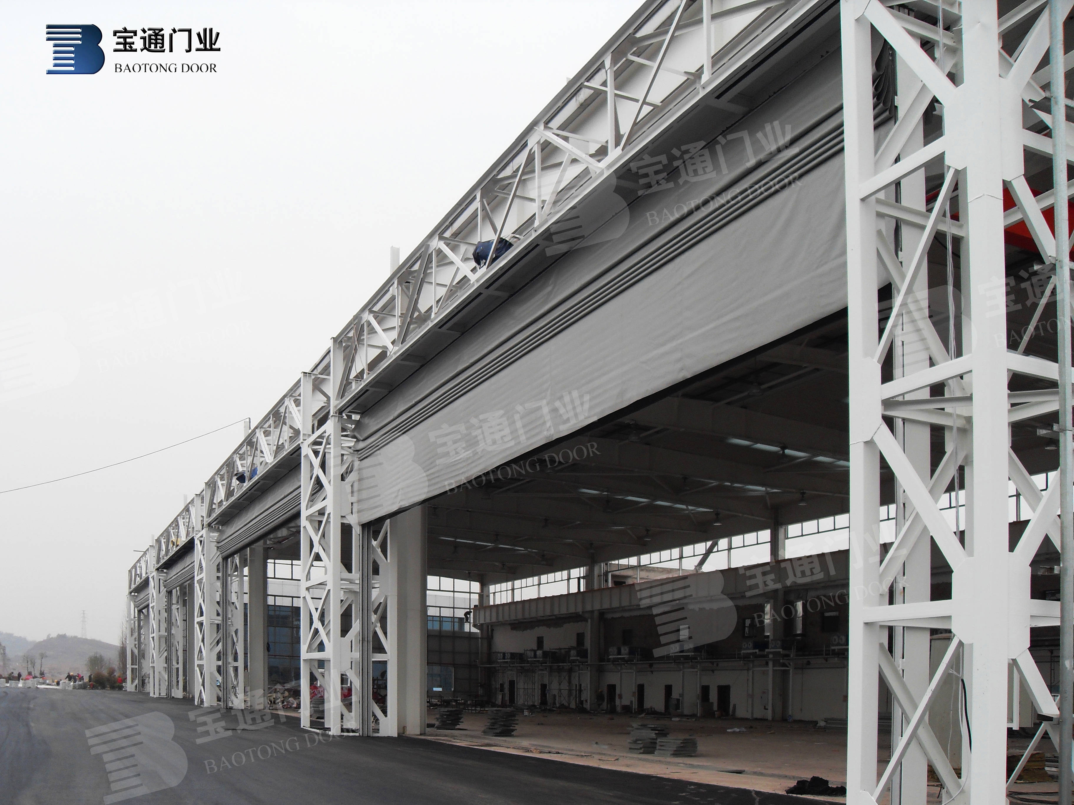 宝通精选 | 柔性堆积门飞机库门项目案例赏析_大门_门布_升降