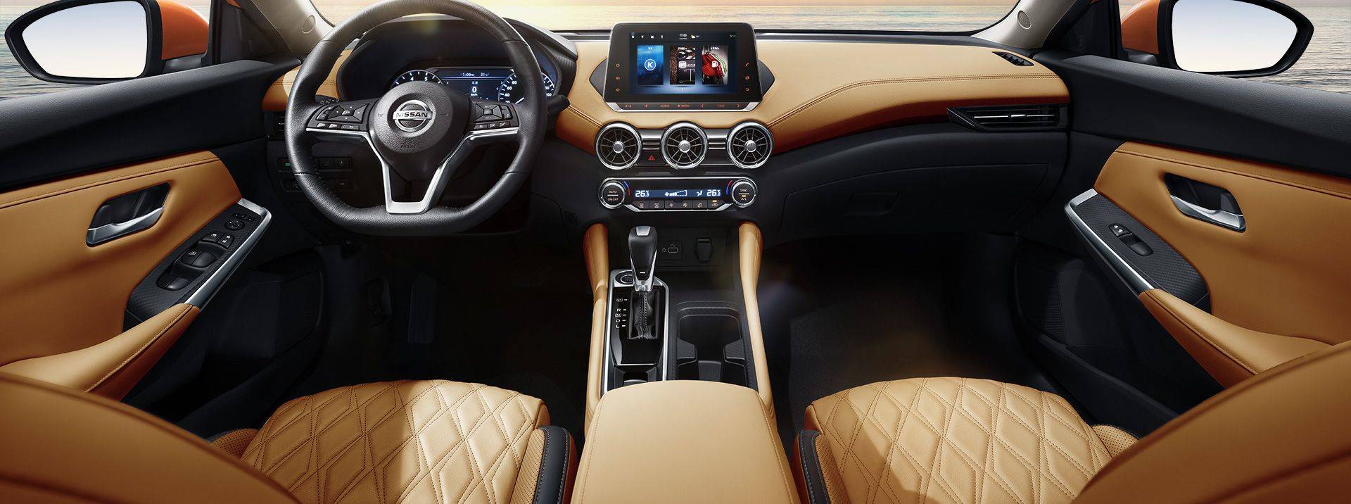 内饰部分,轩逸的中控台采用了较为简洁的设计,由于加入了圆形的空调出