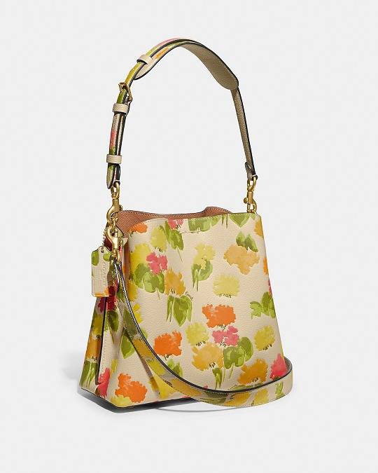 coachfloralprint这样的包包定格花季