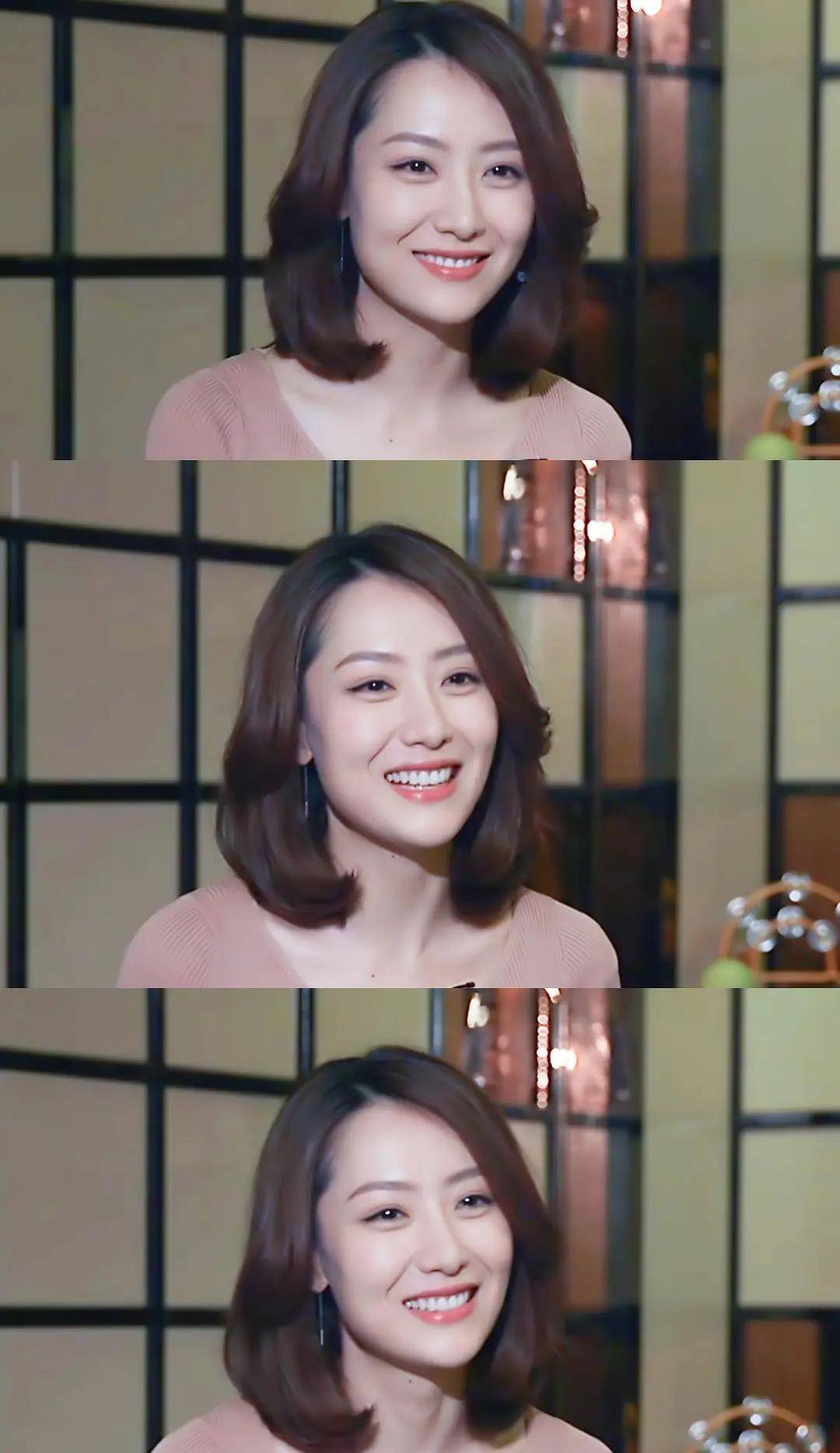 她的笑容端庄中透着干净与干练感,这里就更像金喜善了,但是稚气稍减