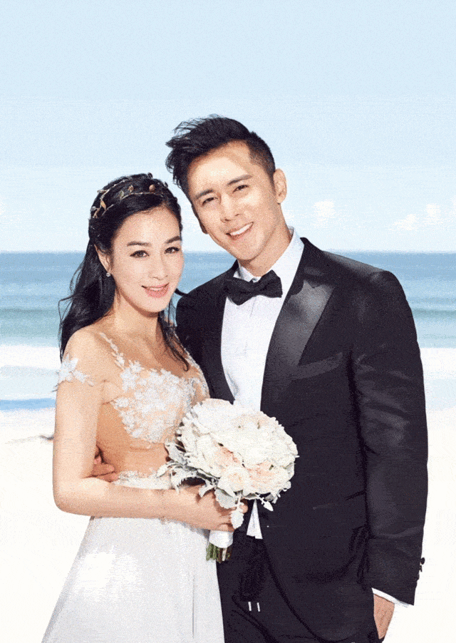 钟丽缇和老公张伦硕携全家现身机场,不顾众人亲吻,女儿表情亮了_考拉