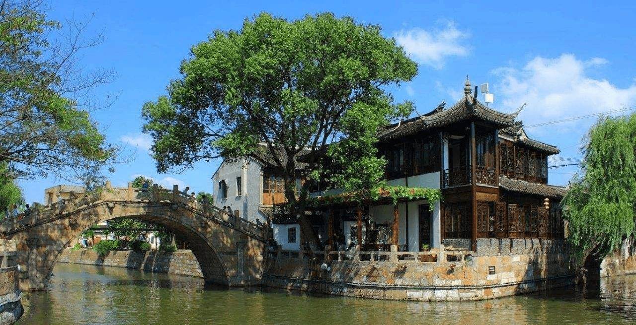 但是上海的宣传不到位,所以才拿来和其他古镇比