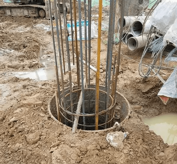 灌注钻孔灌注桩时如何避免钢筋笼上浮?