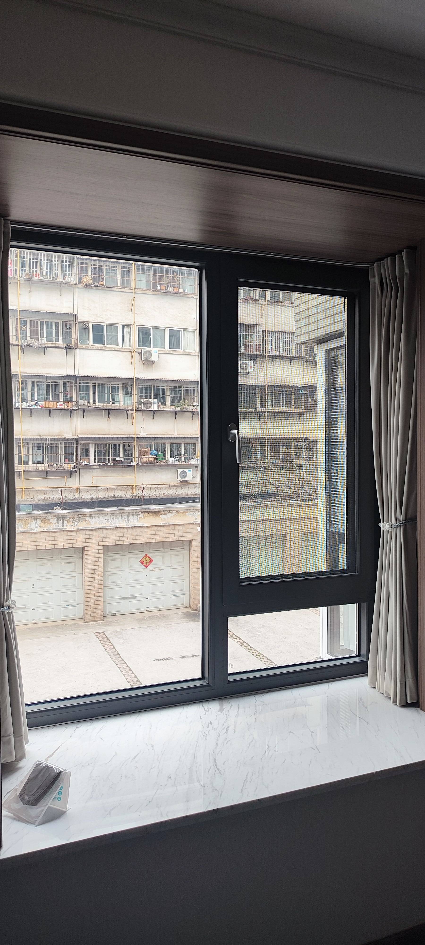 洛阳老小区换门窗,凤皇城90断桥铝钢纱一体门窗安装效果