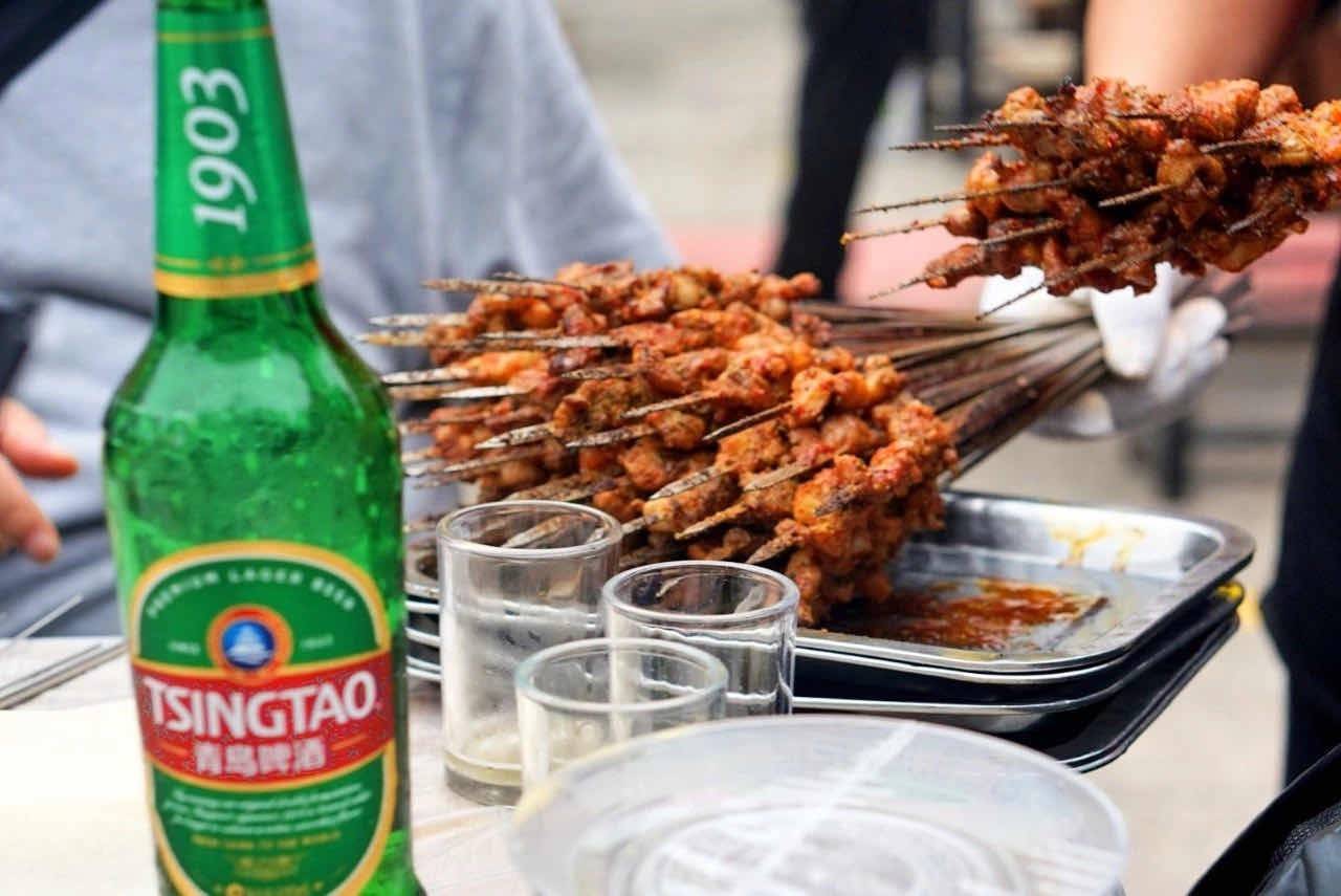 从南到北趁夜一起啤当青岛啤酒端起来时夜生活又回来了