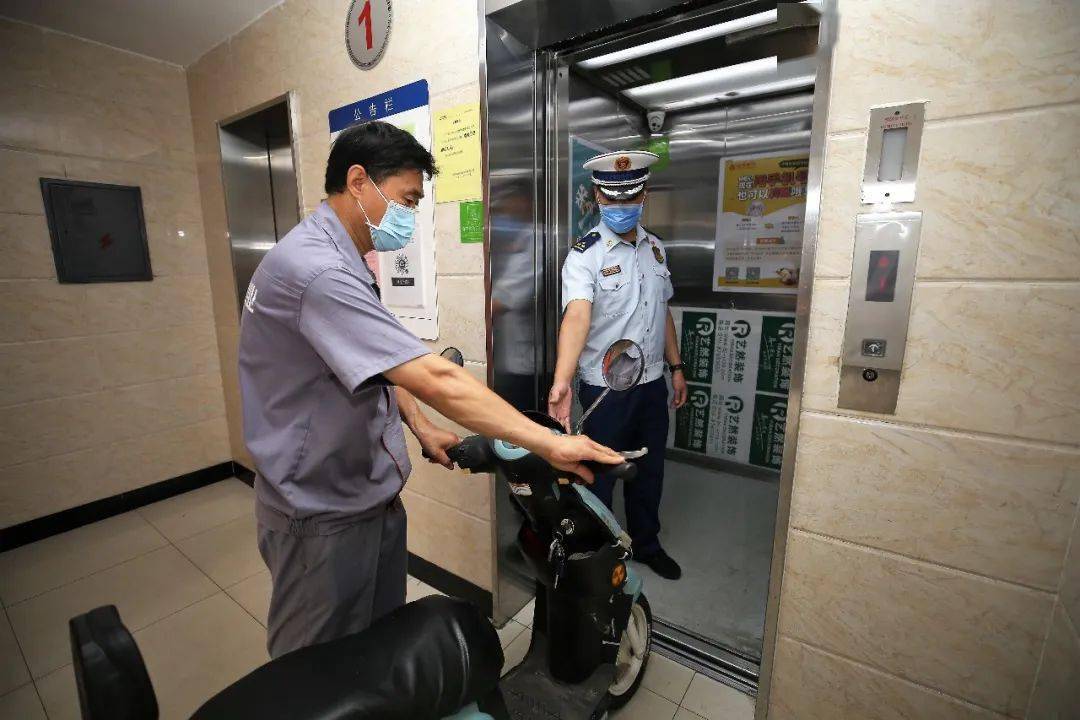 电动车进电梯就告警西城区试点建设电动车禁入楼宇系统