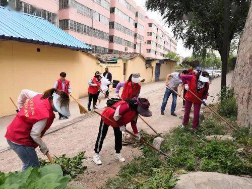 铜川:一抹"志愿红" 扮靓文明城
