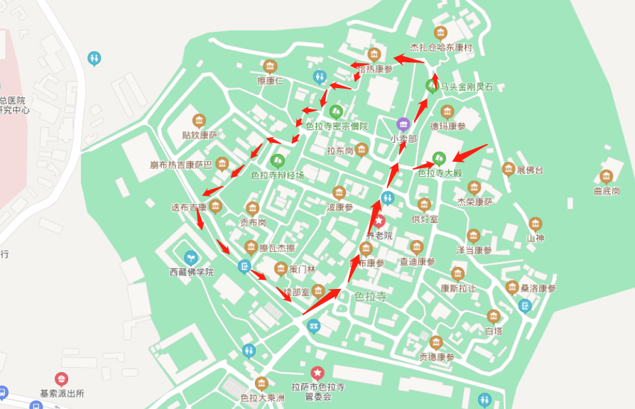 从色拉寺大殿的岔路口出来,见前方有一块色彩亮丽的玛尼石,自然而然地