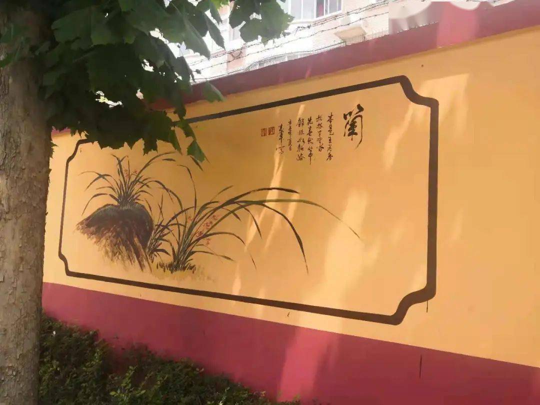 华中物业假日雅典城一面围墙一方文化