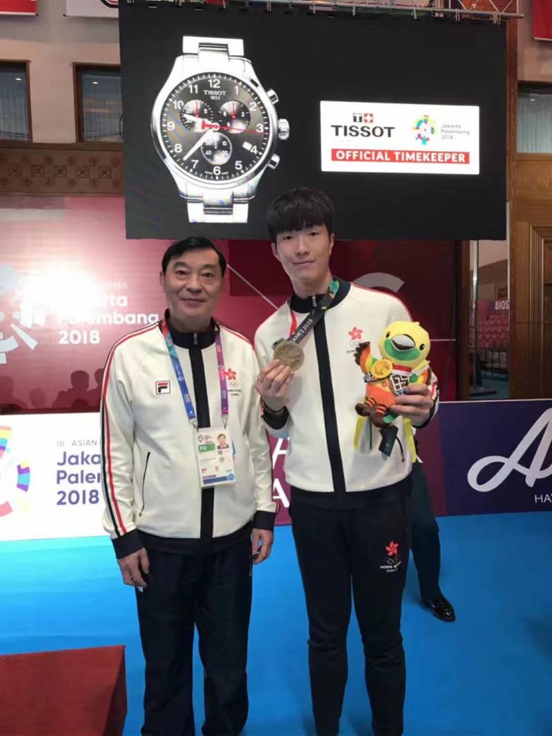 张家朗与汪昌永教练一起参加2018年雅加达亚运会时的