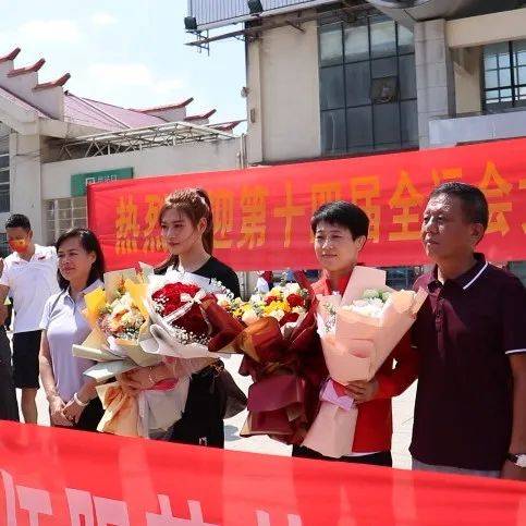 江华籍全运会冠军伍阳英、翟颖载誉归来_亚运会