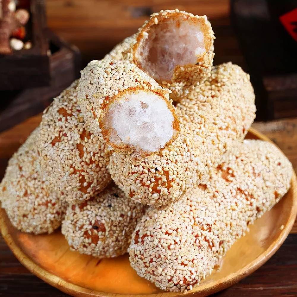 蓼花糖是我小时候最喜欢吃的甜点,圆圆的长长的,相似一个棒槌,外面