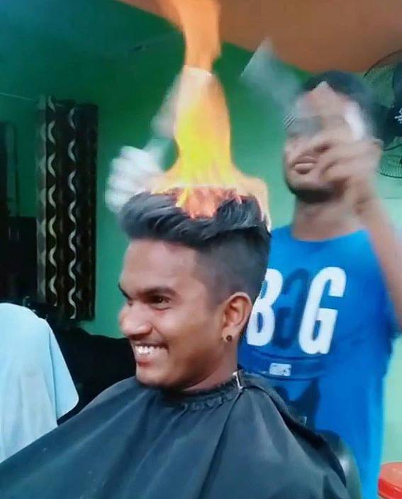 应对停电印度人有奇招理发师用火做造型盗电侠偷电当营生