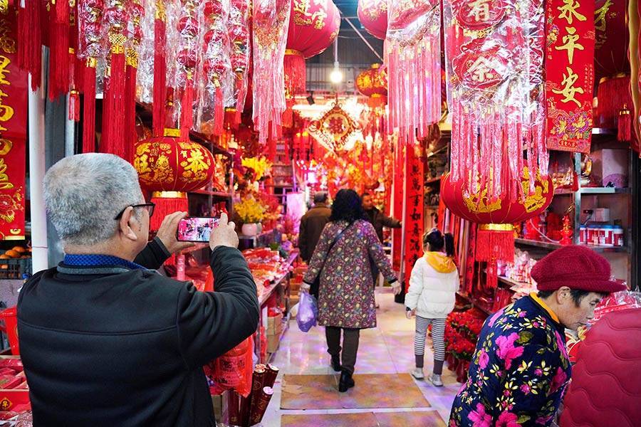 福建|做乌米饭、挂红灯笼、写“福”送福 福建“年味儿”别样浓！