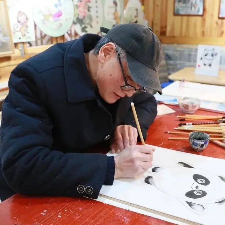我县板刻画民间艺人制作”冰墩墩“板刻画 祝福冬奥_龙溪_吉祥物_民族