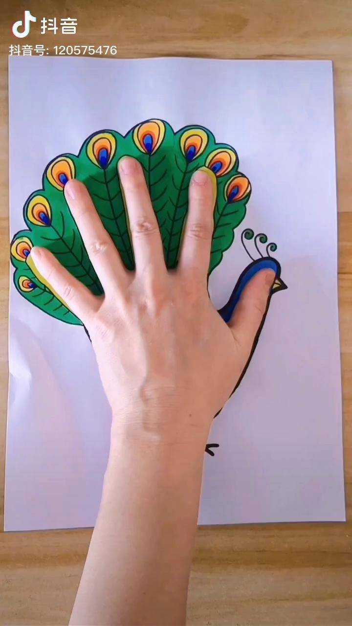 孔雀手指印画简笔画图片