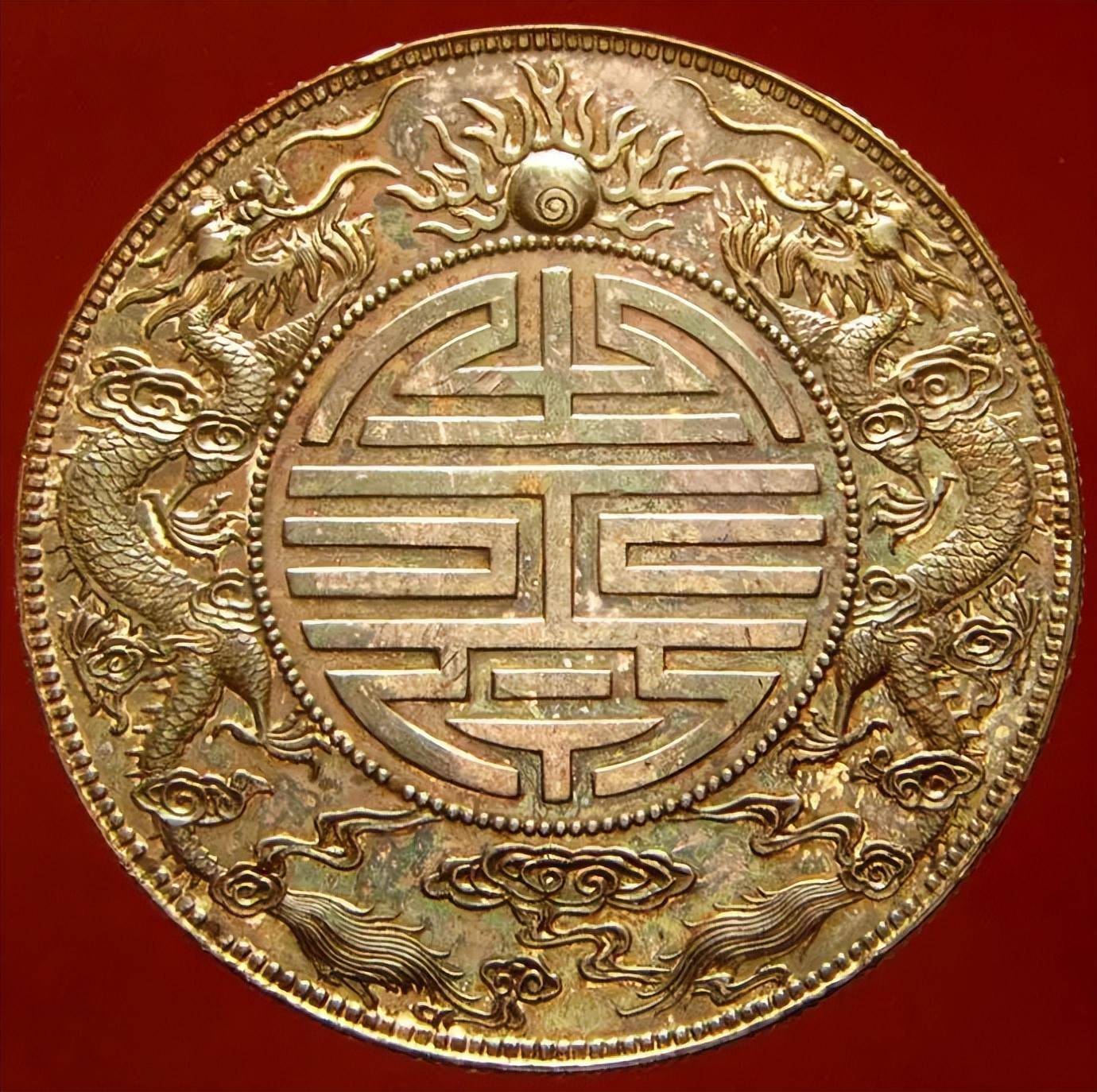 你手中的广东省造双龙寿字币，是真的吗？_搜狐网