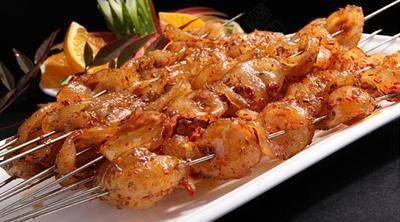 2. 烤牛鞭,以内蒙古草原公牛鲜牛鞭改刀作菊花形,配以枸杞烧制而成.