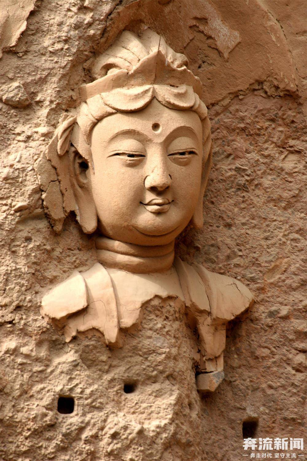 "东方蒙娜丽莎的微笑",残存的菩萨头像(宋代)甘肃的武山水帘洞石窟群