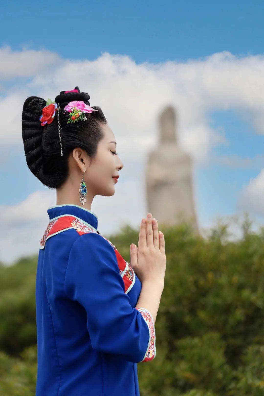 相传是莆田湄洲岛上女子的一种传统装扮湄洲女头饰服饰"灵妃一女子,瓣