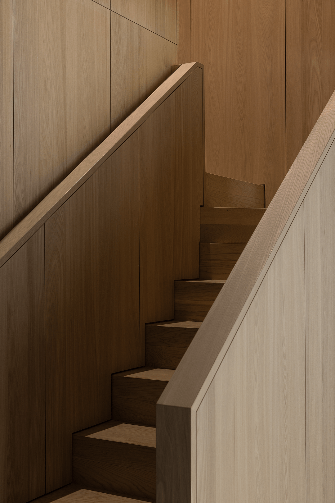 区的木质楼梯,设计师也颇费设计心思,通过楼梯扶手与墙面的剥离设计