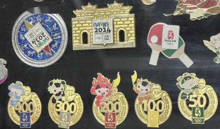 从奥运到亚运,杭州小伙15年集了5000枚pin_徽章_刘礼_比赛