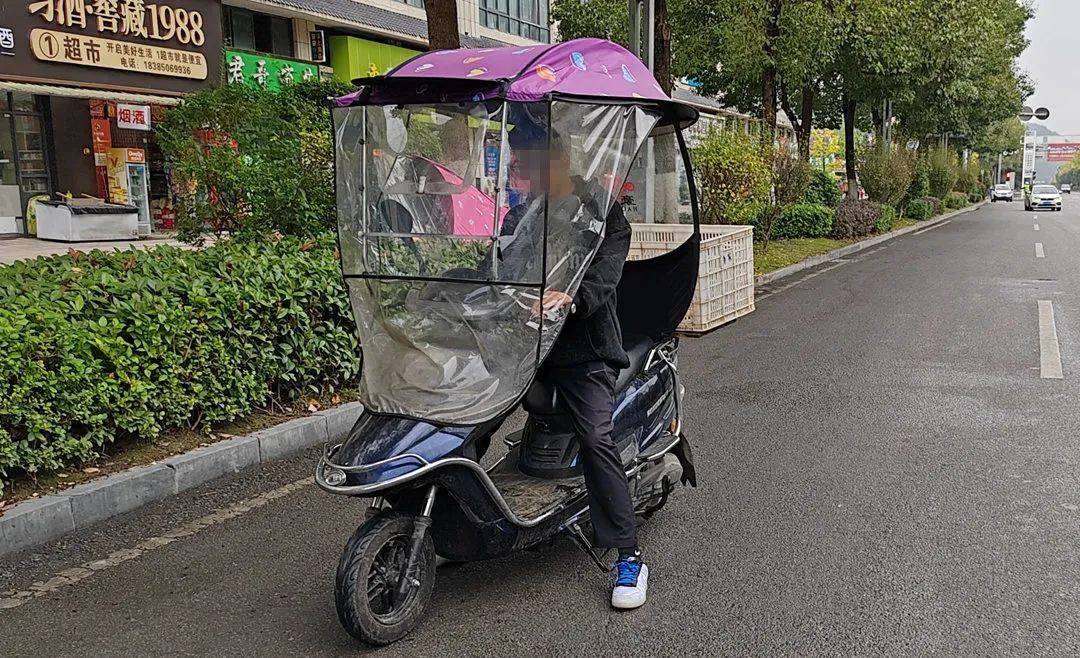 张某驾驶电动自行车未戴安全头盔的违法行为终 审 | 程 克 韩波涛二