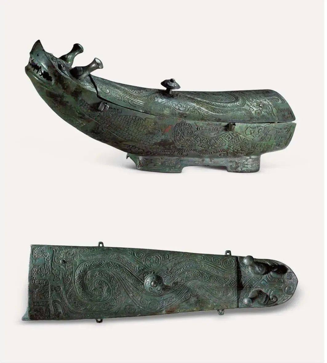 商代龙首觥,山西石楼桃花者村商墓出土,器形纹饰以龙为主,并有鳄鱼纹.